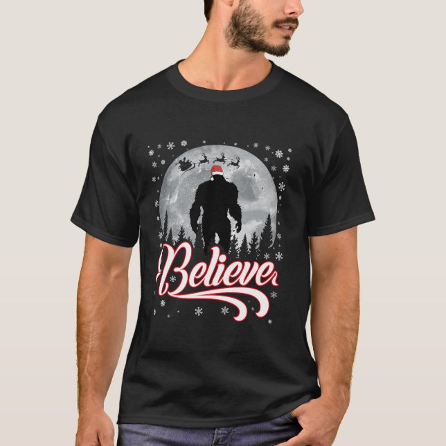 T-shirt Drôle Croire Noël Bigfoot Santa Hat Moon Sce (Devant)