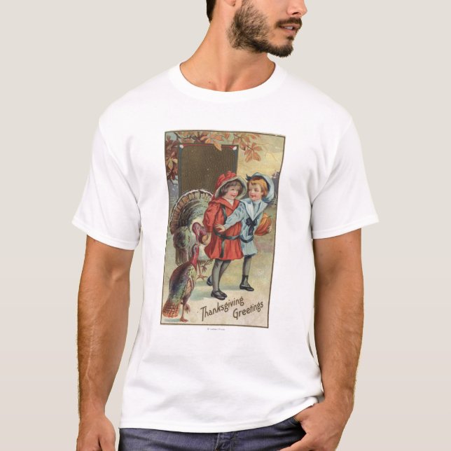 T-shirt Enfants tenant un citrouille, dindes (Devant)