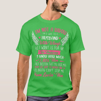 T-shirt Femmes Je suis une femme à un mari avec des ailes 