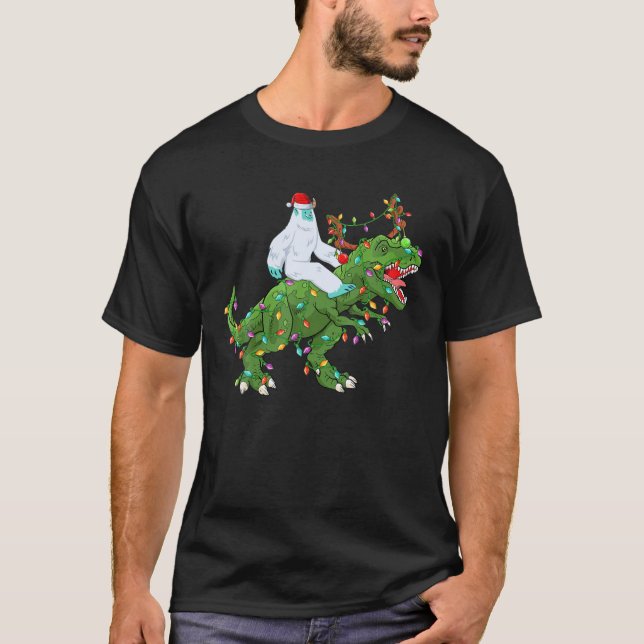 T-shirt Funny Xmas Lumières Père Noël Yeti équitation Dino (Devant)