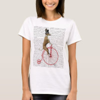 Greyhound sur Red Penny Farthing Bike