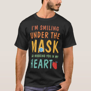 T-shirt Je souris sous le masque et je vous embrasse dans 