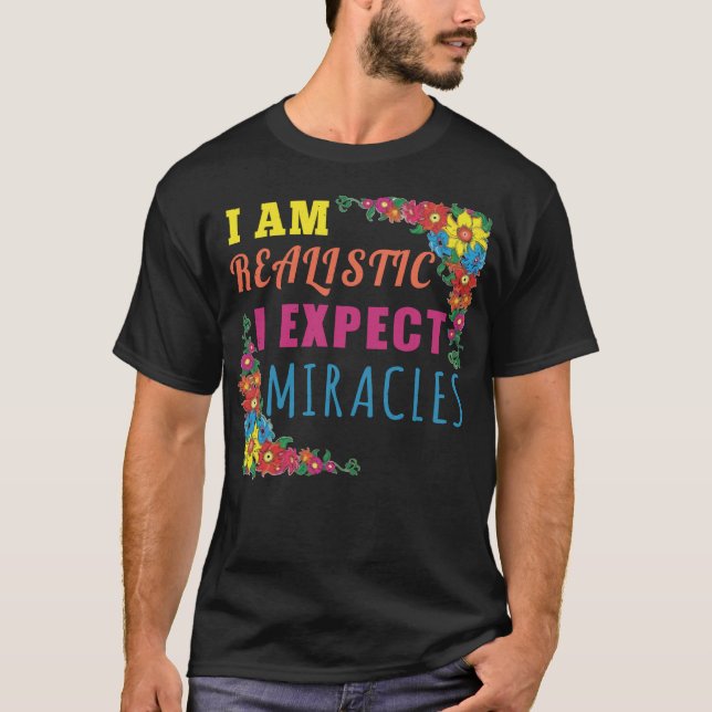 T-shirt Je suis réaliste. J'attends des miracles (Devant)