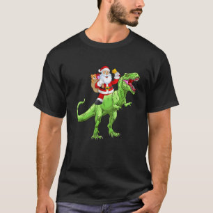 T-shirt Joli Père Noël à cheval sur un dinosaure rex Garço
