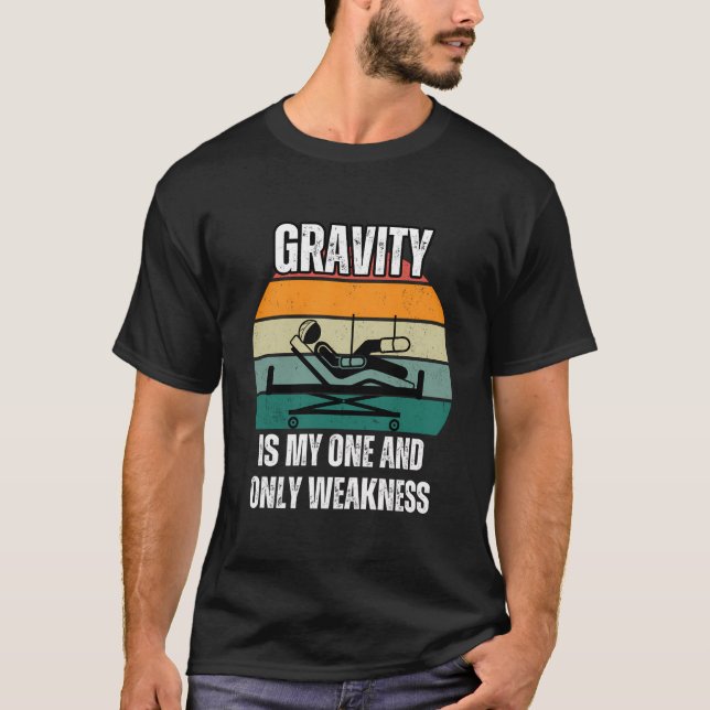 T-shirt La Gravité Est Mon Seul Et Unique Faiblesse Brisé  (Devant)