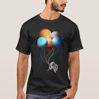 T-shirt L'astronaute tenant la planète monte en ballon la