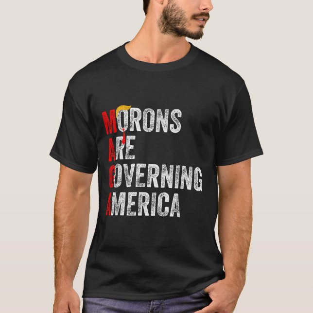 T-shirt Les Morons dirigent l'Amérique Trump drôle 2024 (Devant)