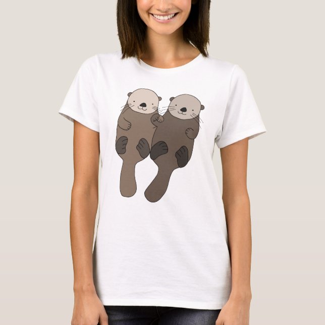 T-shirt Loutre tenant la pièce en t mignonne de graphique (Devant)