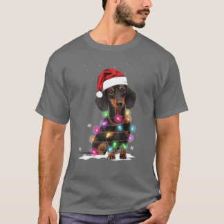 T-shirt Lumières de Noël de teckel avec pull de neige vint