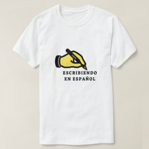 T-shirt Main avec crayon et texte : escribiendo en españo