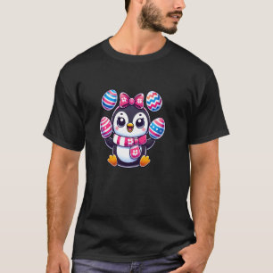 T-shirt Manchot de Pâques jonglant avec des œufs colorés