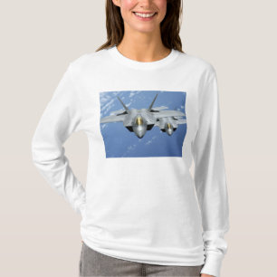 T-shirt Mouche de deux F-22 Raptors au-dessus de l'océan