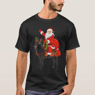 T-shirt Noël Jour férié Père Noël Riding Chien Schipperke 