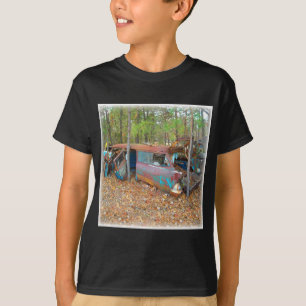 T-shirt Nomade 1957 de Chevy se rouillant dans l'entrepôt