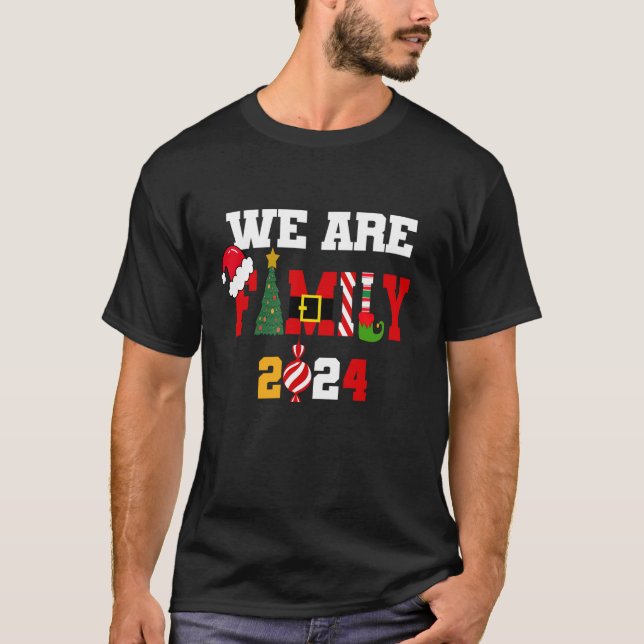 T-shirt Nous sommes la famille Noël 2024 Joyeux Noël Lumiè (Devant)