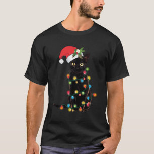 T-shirt Père Noël Chat Noir Tangé Dans La Lumière De L'Arb