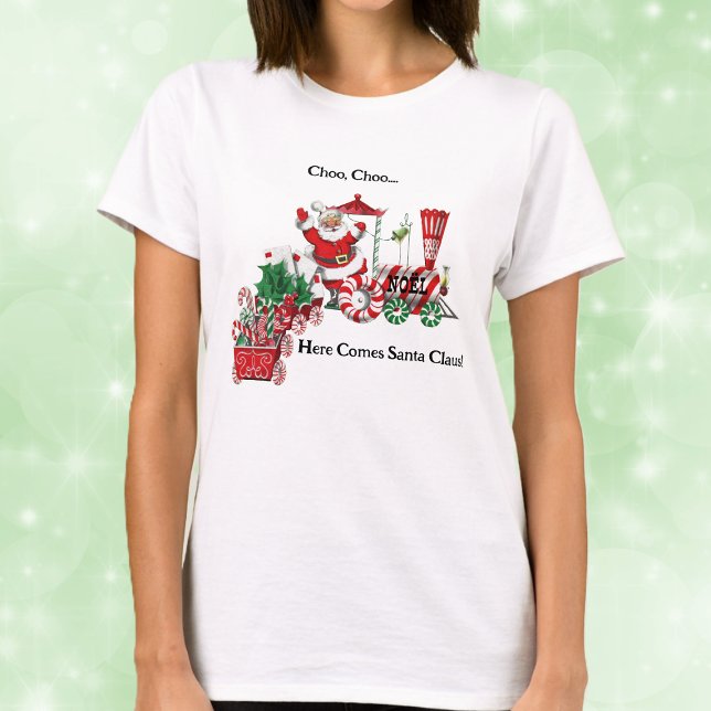 T-shirt Père Noël sur Candy Train avec lettres (Santa riding red white Christmas train candy canes letters on Here comes Santa tee shirt.)