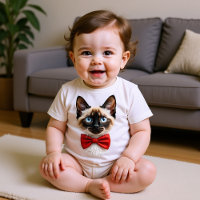 Chaton siamois avec noeud rouge