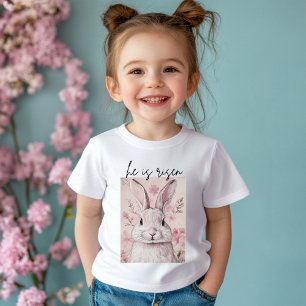 T-shirt Pour Bébé "Il est ressuscité" Lapin rose avec fleur