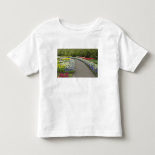 T-shirt Pour Les Tous Petits Allée de trottoir à travers les tulipes et les jon