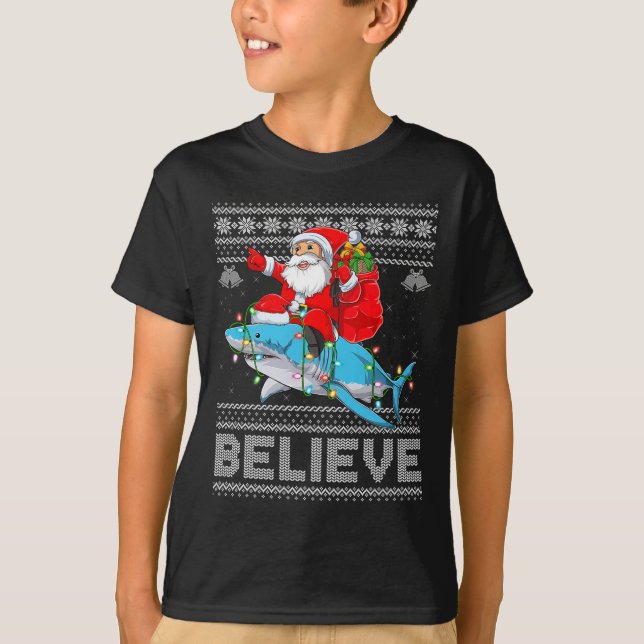 T-shirt Santa Riding Shark Ugly Christmas Sweater Believe  (Devant)