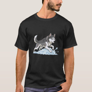 T-shirt Scène de chiot husky éclaboussant dans la neige