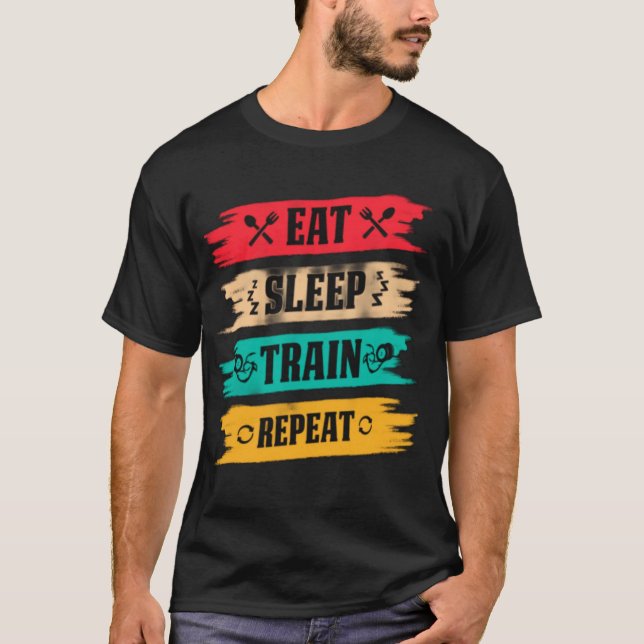 T-shirt Sleep. Train. Repeat. – The Ultimate Fitness Grind (Devant)