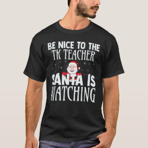 T-shirt Sois gentil avec l'enseignant de PS Santa regarde