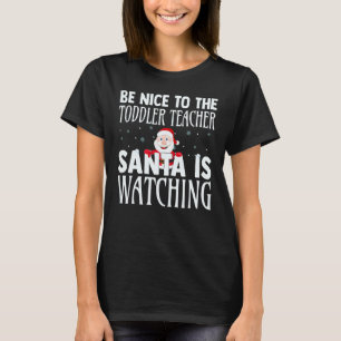 T-shirt Sois gentil avec l'enseignant de tout-petit Santa