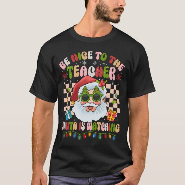 T-shirt Soyez Gentil Avec L'Enseignant Père Noël Regarde R (Devant)