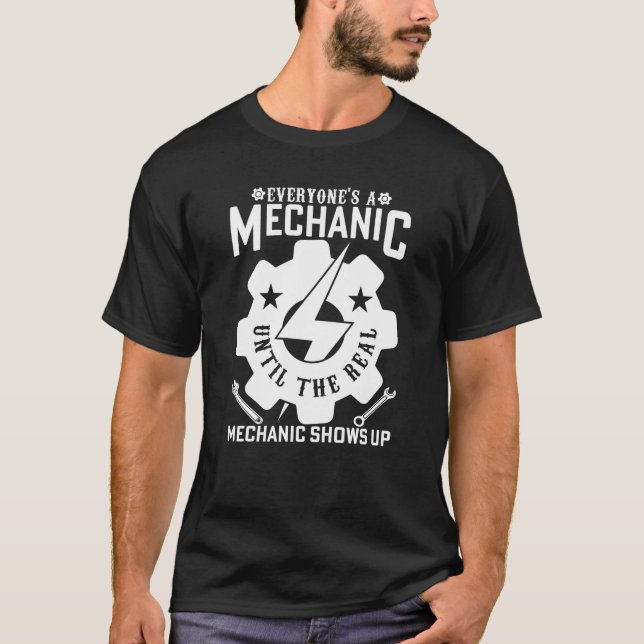 T-SHIRT TOUT LE MONDE EST UNE MÉCANIQUE JUSQU'À LA VÉRITAB (Devant)