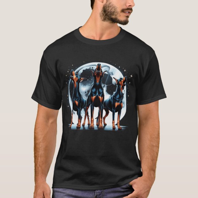 T-shirt Trois Doberman Pinschers hurlent à la lune comme (Devant)