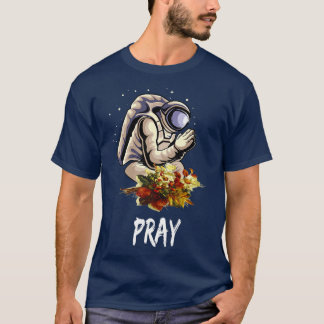 T-shirt Un astronaute priant un homme d'espace prie pour l