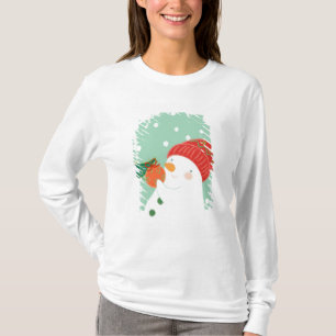 T-shirt Un bonhomme de neige accrochant un ornement sur un