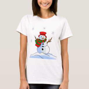 T-shirt Un bonhomme de neige sur la neige et les flocons d