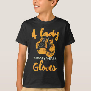 T-shirt Une Dame Porte Toujours des Gants de Boxe Puissanc