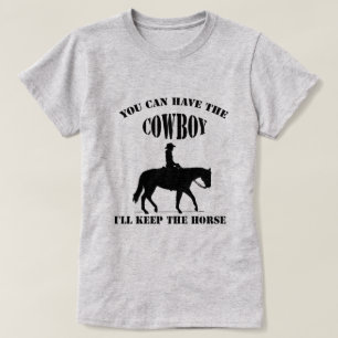 T-shirt Une drôle de petite fille prend le cow-boy garde l