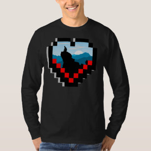 T-shirt Une silhouette solitaire assise sur un sommet de m