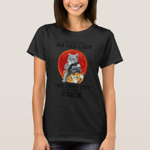 T-shirt Une vieille dame qui aime les chats et est née en