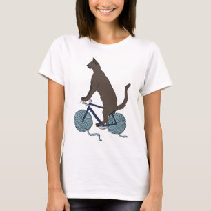T-shirt Vélo d'équitation de chat avec des roues de boule