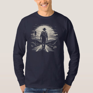 T-shirt voyageur marchant sur la route devant un coucher d