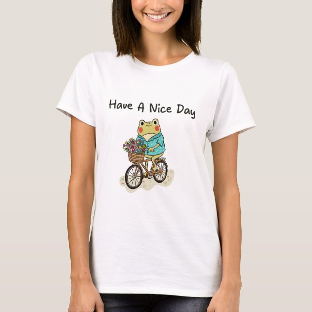 T-shirt Whimsical Frog Riding A Bike Illustration (Devant)