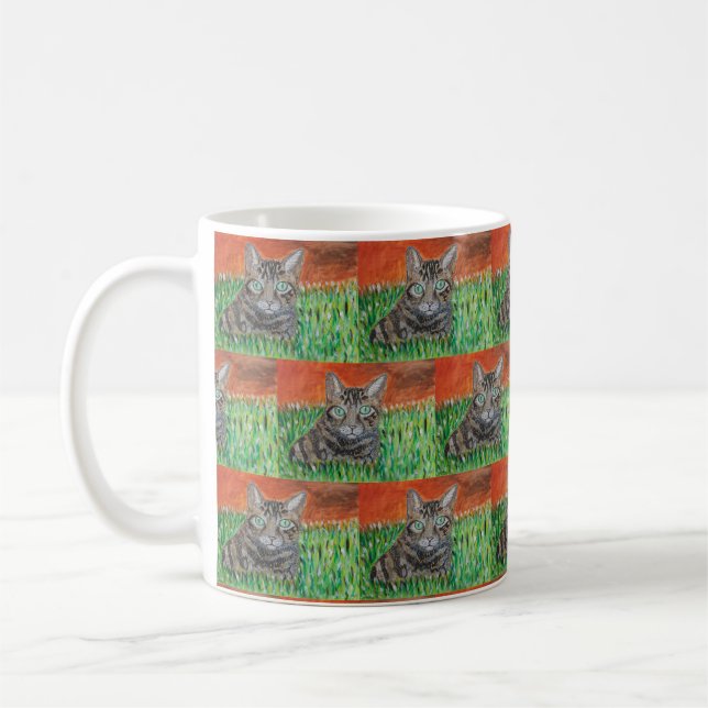 Tabby cat in nature  coffee mug (Left)