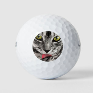 Tabby Cat Licking Paw Golf Balls