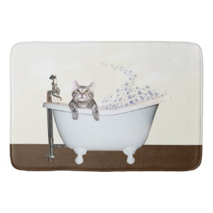 Tabby kitty in bathtub bath mat