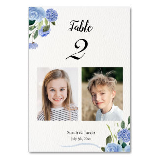 Table de photos d'enfance numéro mariage floral bl