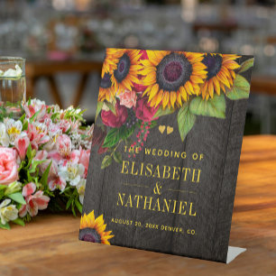 Table Fleurs de soleil et mariage rose rustique signe de