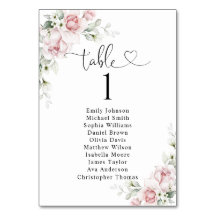Tableau de numéros de table avec des roses roses p