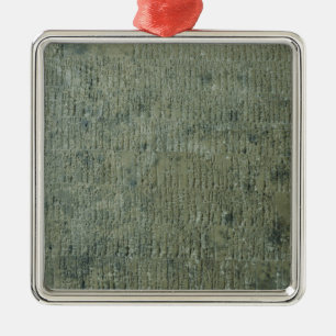 Tablet with cuneiform script metal ornament