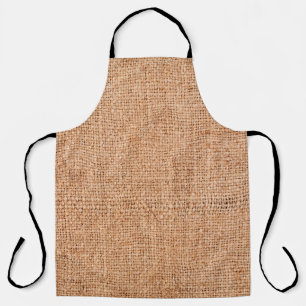 Tablier Brown burlap posé sur une feuille blanche. dossie